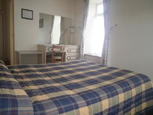 Postel nebo postele na pokoji v ubytování Sancta Maria Hotel