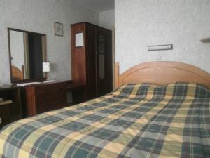 Postel nebo postele na pokoji v ubytování Sancta Maria Hotel