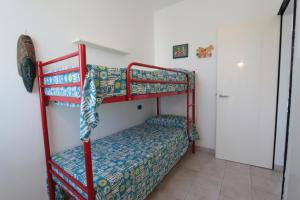 a bedroom with two bunk beds in a room at Residence Vives in Comacchio +18 photos