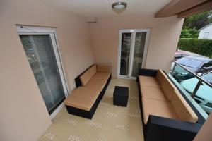 Posezení v ubytování Apartmani FAMILY