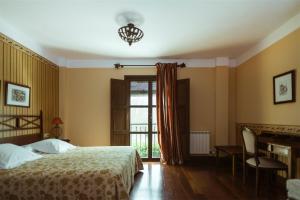 Postel nebo postele na pokoji v ubytování El Tiempo Recobrado - Hotel de silencio y relax