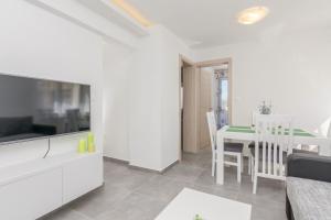 Kuchyňa alebo kuchynka v ubytovaní Apartmani Mustaća dvori