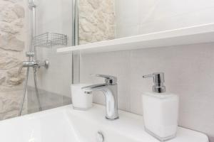 Kúpeľňa v ubytovaní Apartmani Mustaća dvori