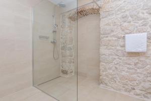 Kúpeľňa v ubytovaní Apartmani Mustaća dvori