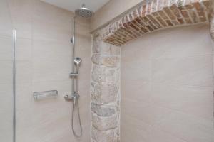 Kúpeľňa v ubytovaní Apartmani Mustaća dvori