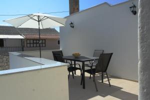 Patio alebo iná vonkajšia časť ubytovania Apartmani Mustaća dvori