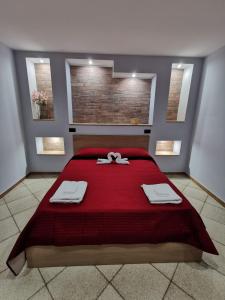 Postel nebo postele na pokoji v ubytování Bed and Breakfast Picentia 19