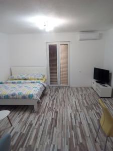 Postel nebo postele na pokoji v ubytování Studio apartman Matković