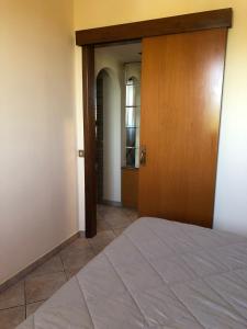 Postel nebo postele na pokoji v ubytování Casa di Paola mare Ardea