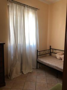 Postel nebo postele na pokoji v ubytování Casa di Paola mare Ardea