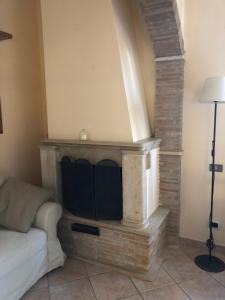 TV a/nebo společenská místnost v ubytování Casa di Paola mare Ardea