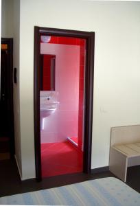 Postel nebo postele na pokoji v ubytování Albergo Riviera Spineta