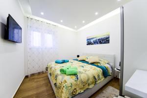 Ένα ή περισσότερα κρεβάτια σε δωμάτιο στο Lipo je