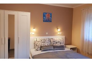 A bed or beds in a room at TimiBá
