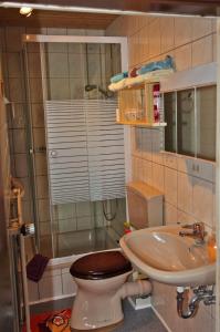 Ванная комната в Ferienwohnung Sauer