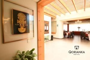Um certificado, prêmio, placa ou outro documento exibido em Qorianka Hotel