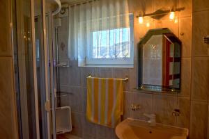 Kúpeľňa v ubytovaní Apartament Anna + 7 fotografií