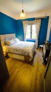 Posteľ alebo postele v izbe v ubytovaní D16 Athens Apartment - 5' mins to Petralona Metro