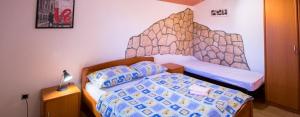 Fotografia z galérie ubytovania Apartment in Lopar with Balcony, Air condition, WIFI (4739-3) v destinácii Lopar