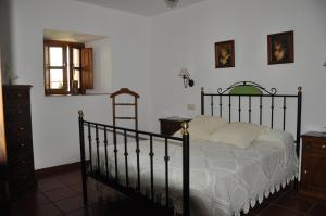 Postel nebo postele na pokoji v ubytování Posada la Torre