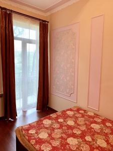 Katil atau katil-katil dalam bilik di Truskavets Lux Apartment