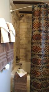 A bathroom at Adobe Inn at Cascade