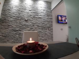 TV a/nebo společenská místnost v ubytování Suite petit
