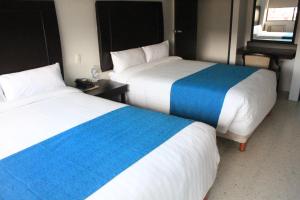 Letto o letti in una camera di Hotel Ros Gaud