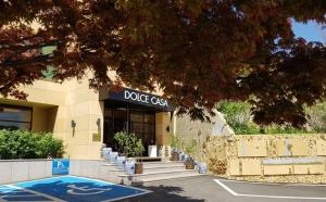 a dodge cross building with benches in front of it at Namyangju Bukhangang dolcecasa hotel in Namyangju