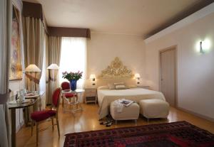 Una cama o camas en una habitación de Hotel Liassidi Palace