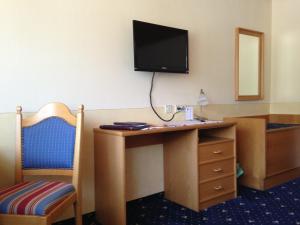 TV a/nebo společenská místnost v ubytování Hotel Bergheimat
