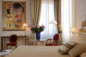 Una cama o camas en una habitación de Hotel Liassidi Palace