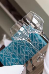 a glass wine glass sitting on top of a table at Belmont Llandudno in Llandudno