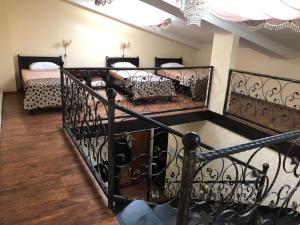 Postel nebo postele na pokoji v ubytování Hotel Meduza