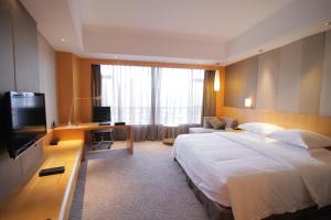 Et tv og/eller underholdning på Huangyan Yaoda Hotel