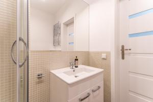 Kúpeľňa v ubytovaní Kolorowe Balkony - Stylowy Apartament nad Morzem by Noclegi Renters