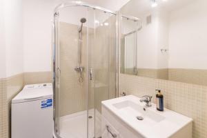 Kúpeľňa v ubytovaní Kolorowe Balkony - Stylowy Apartament nad Morzem by Noclegi Renters