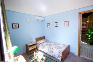 Postel nebo postele na pokoji v ubytování Sassari-In