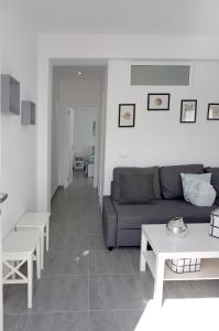 A seating area at Apartamento Conpe