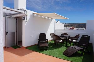 A seating area at Apartamento Conpe