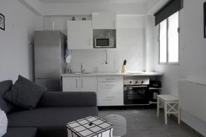 A kitchen or kitchenette at Apartamento Conpe