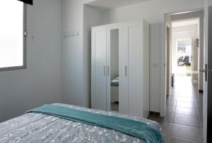 A bed or beds in a room at Apartamento Conpe
