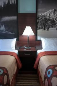 Voodi või voodid majutusasutuse Quality Inn Wenatchee-Leavenworth toas