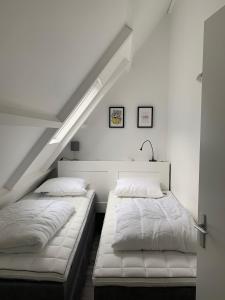 Een bed of bedden in een kamer bij Boothuis Harderwijk