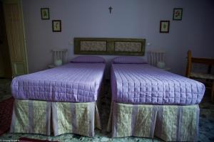 Postel nebo postele na pokoji v ubytování Sassari-In