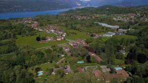 an aerial view of a town with a lake at Green Hill Property in Besozzo