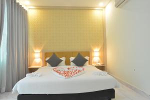 Sangkahak Mith Hotel客房内的一张或多张床位