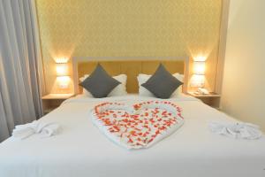 Sangkahak Mith Hotel客房内的一张或多张床位