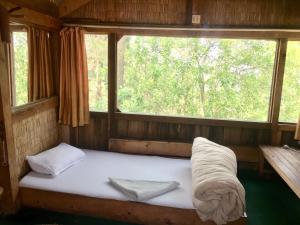 Ліжко або ліжка в номері Hotel At The End Of The Universe