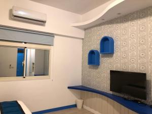 TV o dispositivi per l'intrattenimento presso Cicada said Greece Homestay